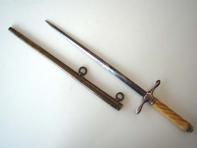 A nice early 19th c. British Naval Dirk with 8" Blade and Brass Scabbard signed "G. Banks, Plymouth Docks" circa 1800-1815.